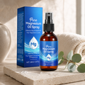 Pure Magnesium Oil Spray bottle and box with eucalyptus leaves on marble surface
